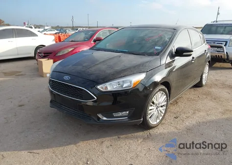 2016 Ford Focus Titanium z USA, uszkodzony, nr VIN 1FADP3N27GL374838